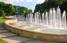 The Grand Cascade water feature in the heart of the Alnwick Garden, Northumberland. This developing garden is the inspiration of Jane, Duchess of Northumberland whose vision is to develop it into a contemporary garden that integrates water and light into a theatre of gardens. Its dramatic main feature is the Grand Cascade which is a magnificent tumbling mass of water ending in an eruption of fountains sending 350 litres of water into the air every second. The sequence lasts 12 minutes., The Alnwick Garden, Northumberland, England.